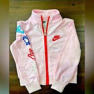 Light pink collared Nike jacket